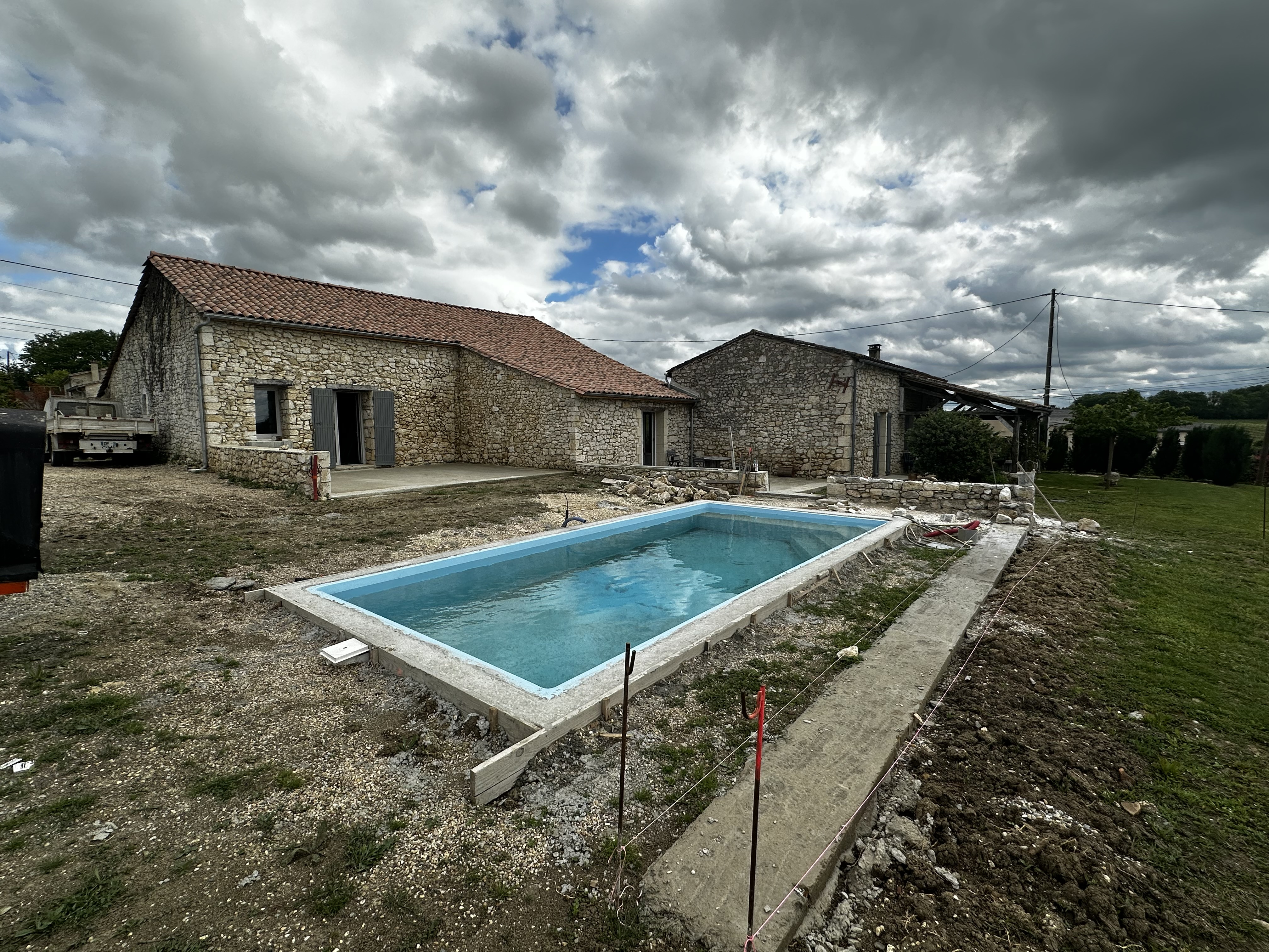 Habitable Main House and Two House to Renovate