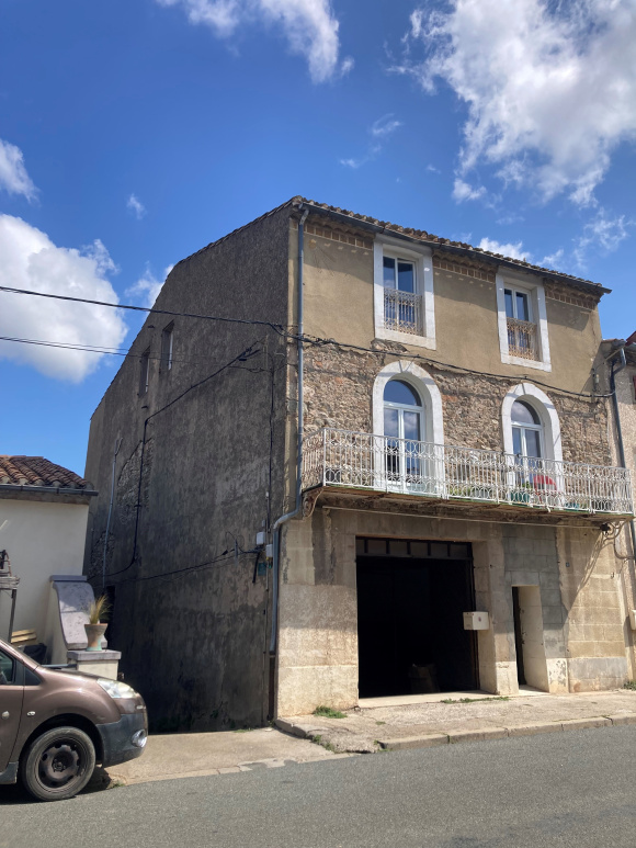 Village House with Balcony Views and Large Garage