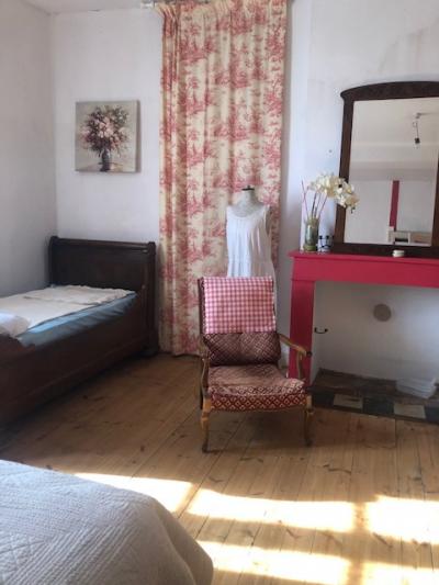 Character House in a Quiet Village Setting