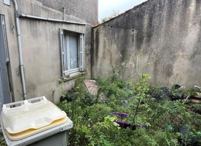 House To Renovate With Garage and Courtyard