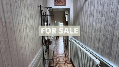 Character in Village with Garden and Garage