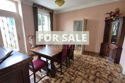 Character in Village with Garden and Garage