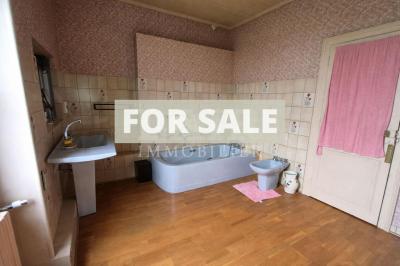 Character in Village with Garden and Garage