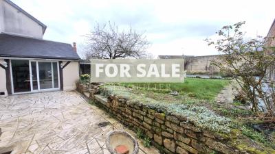Character in Village with Garden and Garage