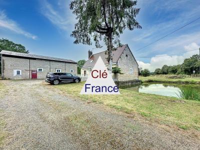 Farmhouse with Outbuildings and Pond