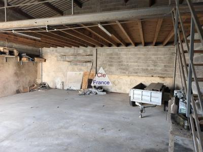 Large Garage with Many Possibilities