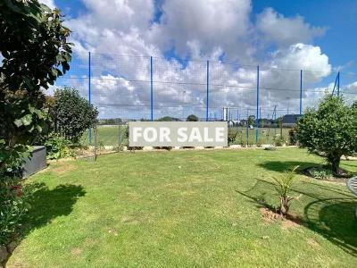 Detached Coastal House with Landscaped Garden