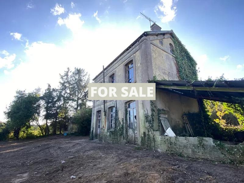 Detached House and Outbuildings by the Coast