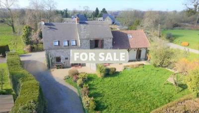 Two Houses Surrounded By Countryside