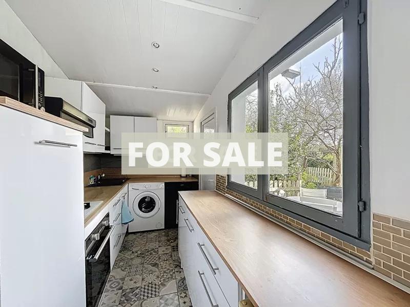 Two Houses with Garden by the Coast