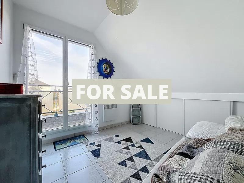 Detached Coastal House with Landscaped Garden