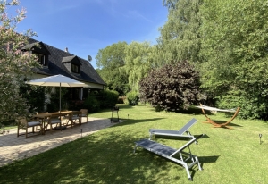 Detached House with Landscaped Garden by a River
