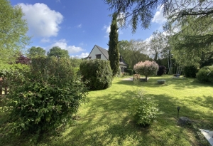 Detached House with Landscaped Garden by a River