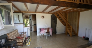 Charming and Cosy House with Bridge over Pond in Garden