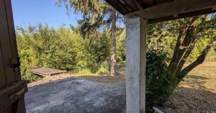 Charming and Cosy House with Bridge over Pond in Garden