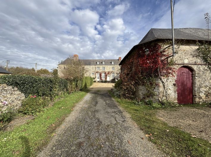 Manor House and Outbuildings in the Countryside