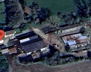 Farm Complex in Rolling Countryside Setting