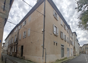 House To Renovate Overlooking a Square