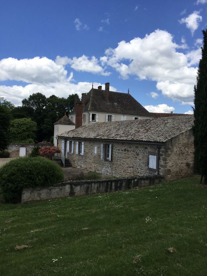 Vast Manor House with Other Houses and Outbuildings
