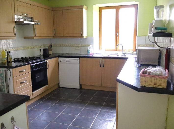 Detached Former Farmhouse with Outbuilding and Land