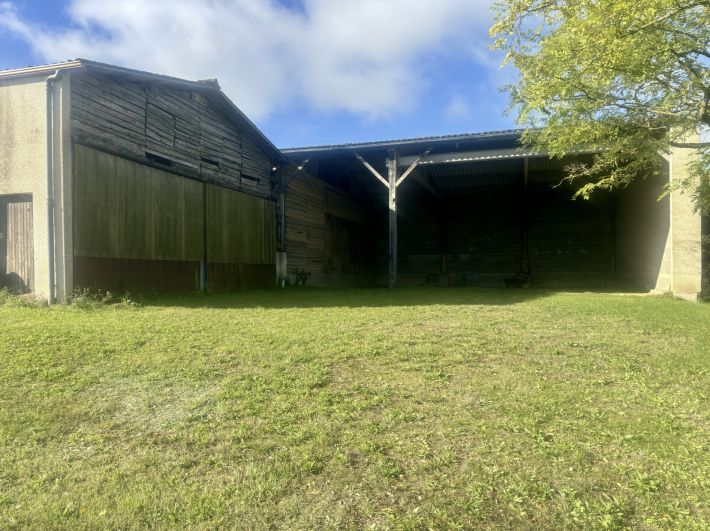 Farm House and Many Outbuildings