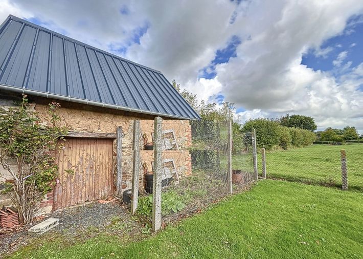 Village House with Open Rural View from Garden