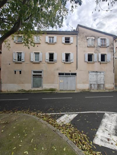 House To Renovate Overlooking a Square